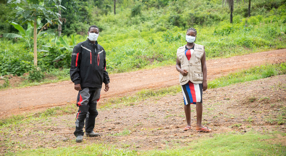 health workers wearing masks and social distancing