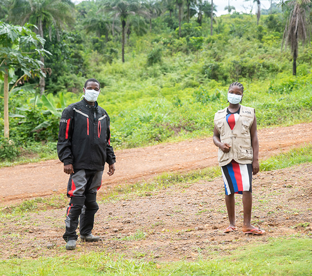 health workers wearing masks and social distancing