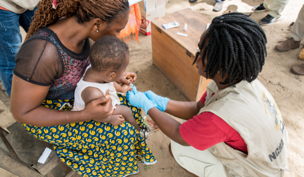 A community health worker performs a malaria rapid diagnostic test in Rivercess County, Liberia.